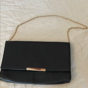 Elegant Black Clutch with Gold Chain